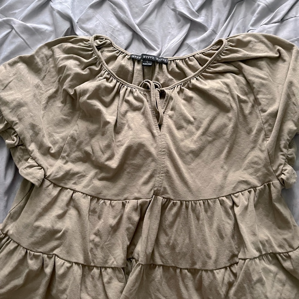 Size L going out flare top